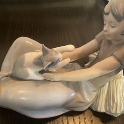 Lladro Nao porcelain figurine of a girl sitting with her cat, #0313, retired, dated 1981