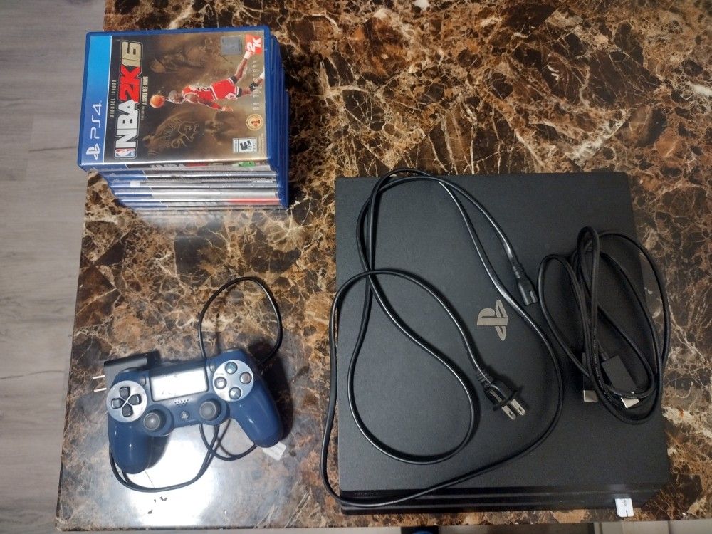 PS4 Slim 1tb. Controller..Games..Cords. Charger..