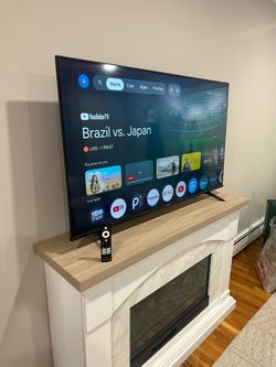 55” Hisense TV & Roller Stand