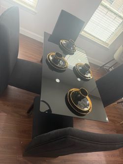 Black Glass Dining Table with 4 Upholstered Chairs