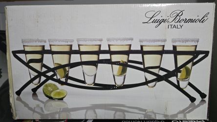 New Luigi Bormioli 7-piece shooter set featuring six glasses and a black metal carrier.