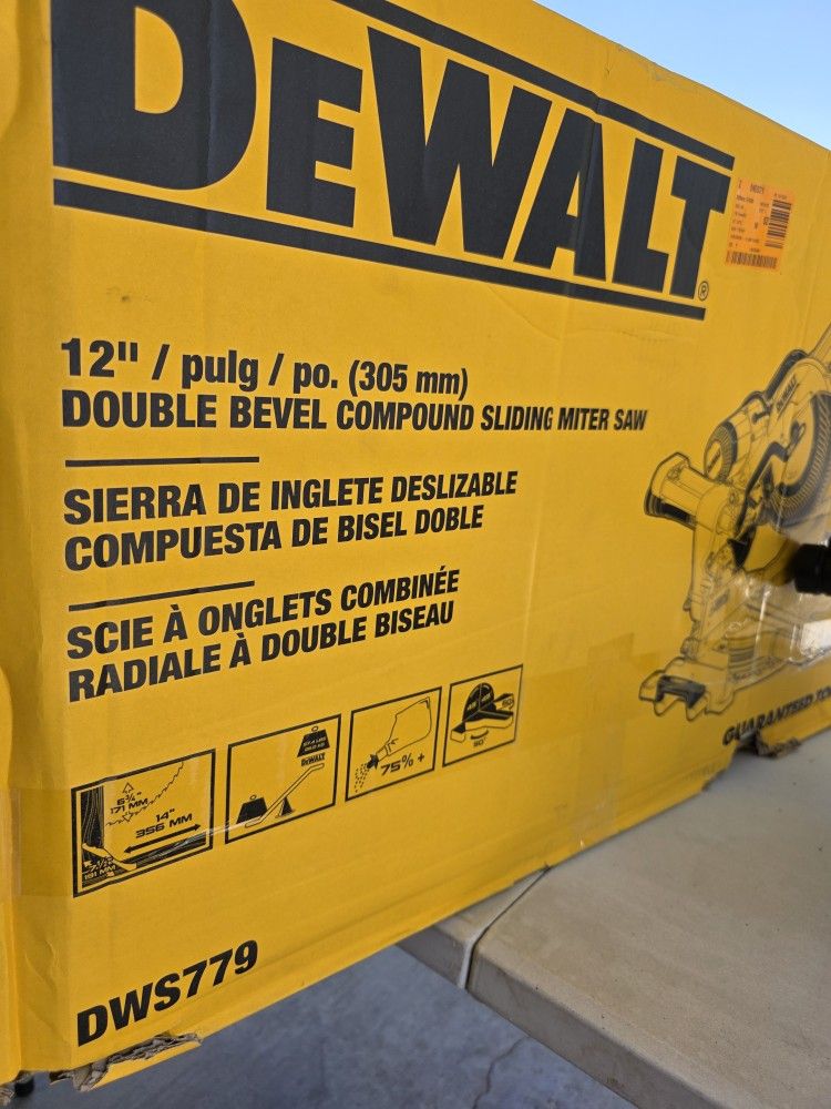SLIGHTLY USED DEWALT CORDED 12" SLIDING COMPOUND MITER SAW. $335