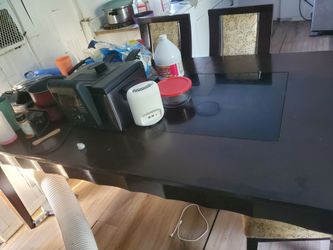 Large solid table... two middle sections glass