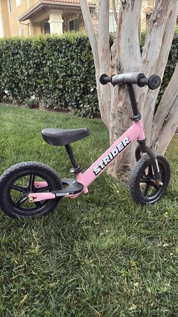 Strider pink toddler bike