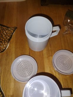 A pair of spice shakers