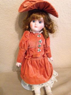 Heritage porcelain doll