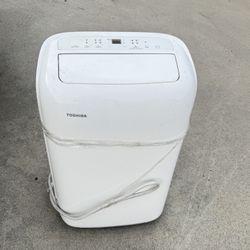 Toshiba portable air conditioner  8,000 (DOE) BTU Portable Air Conditioner Cools 350 Sq. Ft. with Dehumidifier and Remote in White