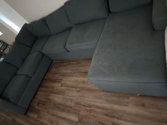 living space 3 piece couch sits 7 to 8 