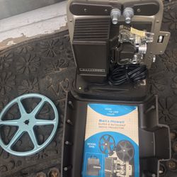 Very nice Vintage Bell and Howell 8 mm projector with paperwork only $80 firm