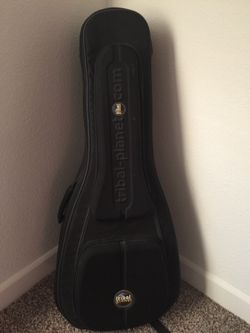 Case and acoustic guitar