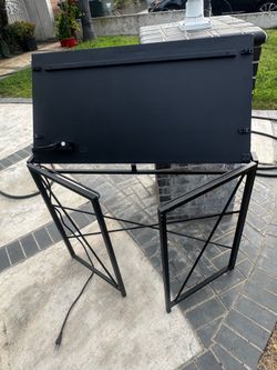 Desk table with cord for outlet