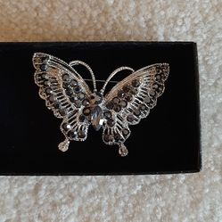 Sparkly silver tone butterfly brooch