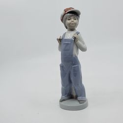 Vintage Lladro 4898 Boy From Madrid Porcelain Figurine Retired With
Accordion figurine. Hand main in Spain.
Designed by renowned sculptor Francisco C