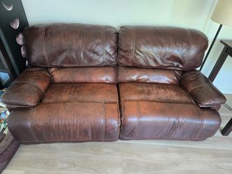 Dark brown leather reclining couch