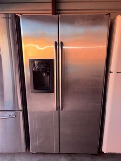 GE Stainless Steel Refrigerator And Freezer