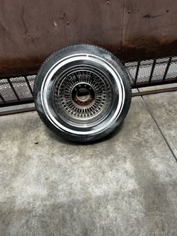 1” 14x7,wire wheel “ Not Dayton” rims and tires “