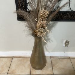 Vase with dried arrangement