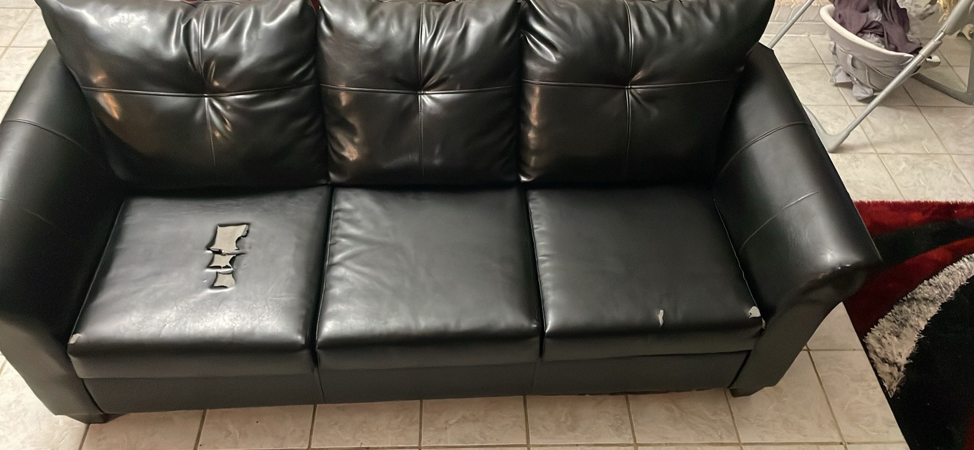 Black Leather Couch.