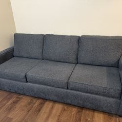 Gray Living Spaces Couch