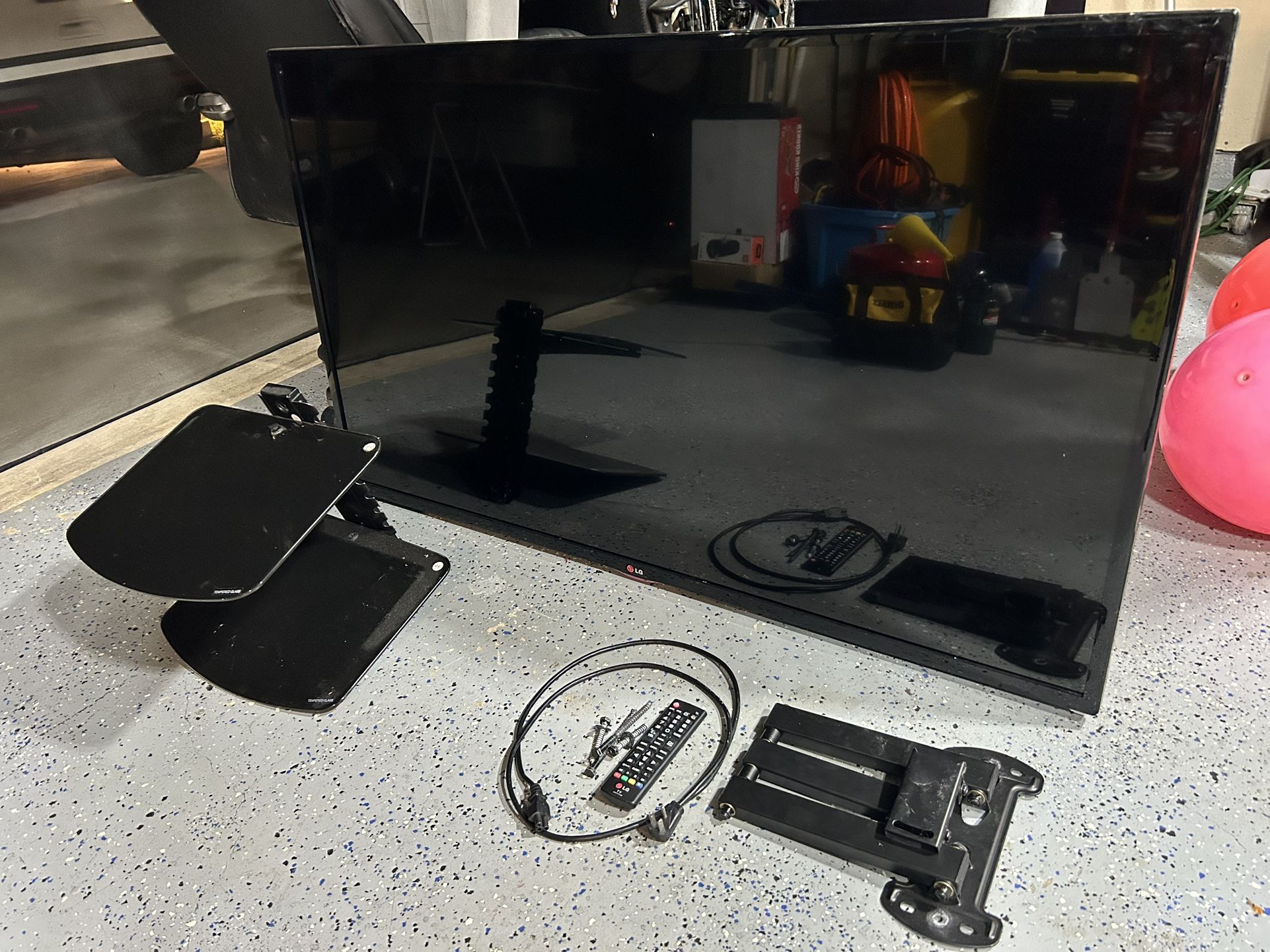 55” LG TV, Wall Mount, Floating Glass Shelves