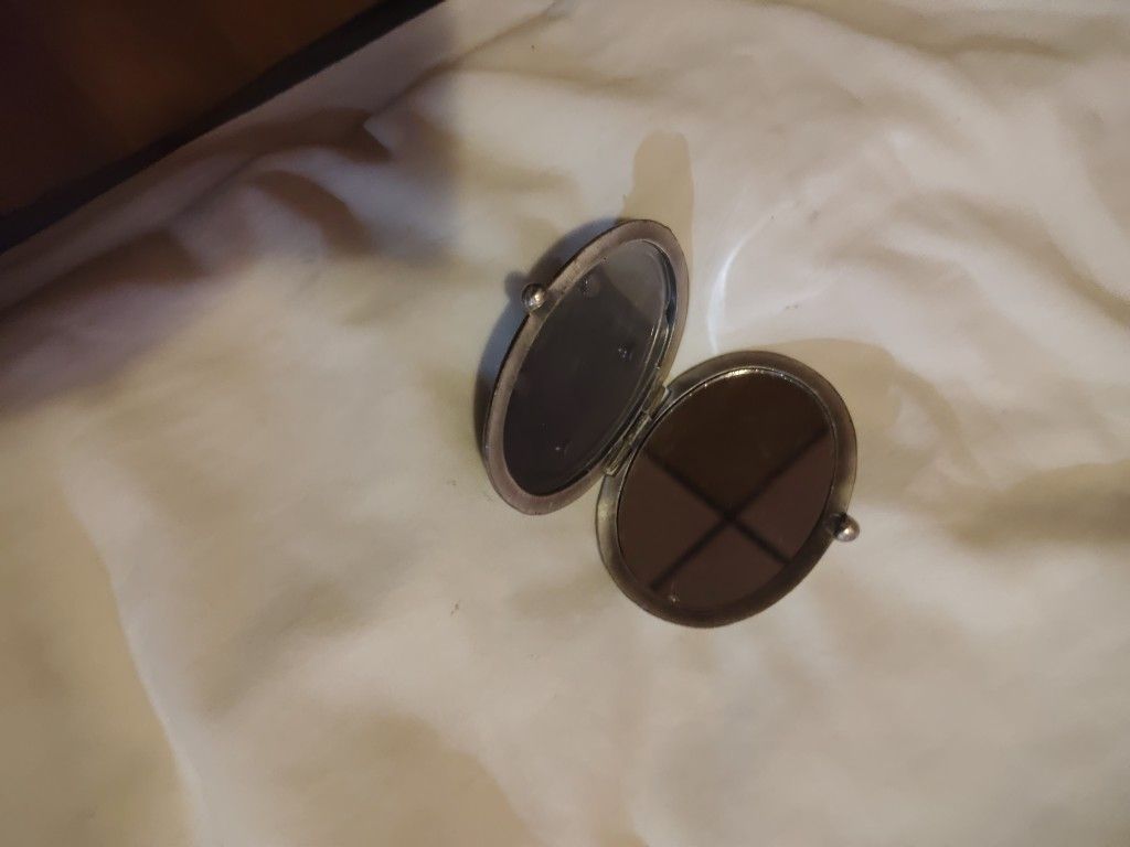 Dorothy Gray Antique Brass Mirror.