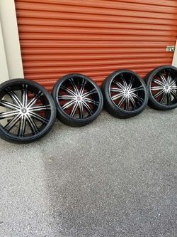24s with new tires 255/30/24 bolt pattern 5x150