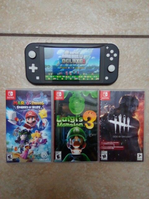  Grey Nintendo Switch Lite With 4 Games.