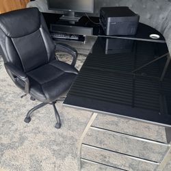 Black Glass desk with metal legs. Also included are new leather computer chair, Acer Monitor, Epson printer and Logitech keyboard.