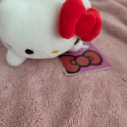 4" Hello Kitty in Blue Overall laying down Stuffed Plush