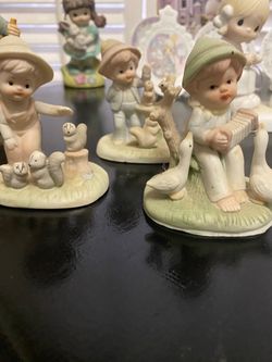 Vintage Porcelain Child Figurines with Animals
