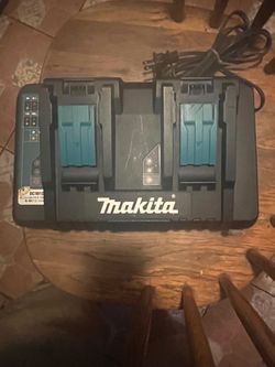 MAKITA CHARGED 18VOLT FOR TWO BATTERY AND USB NEW.$65