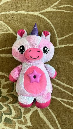 Unicorn stuffy with light projector