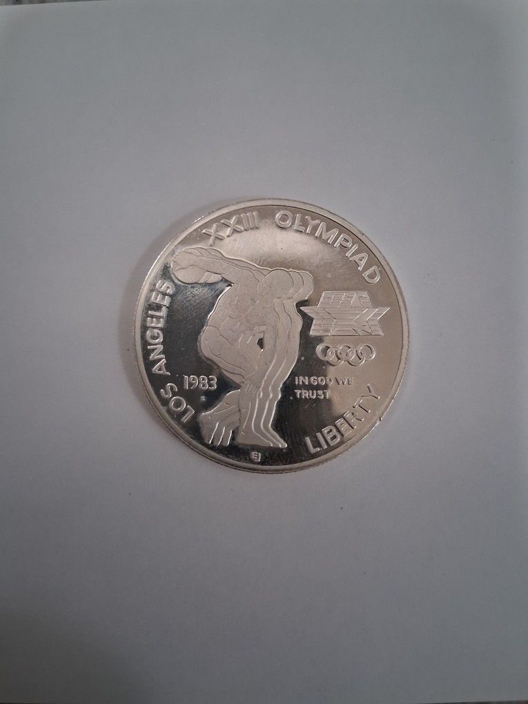 Olympiad One Dollar Silver Coin
