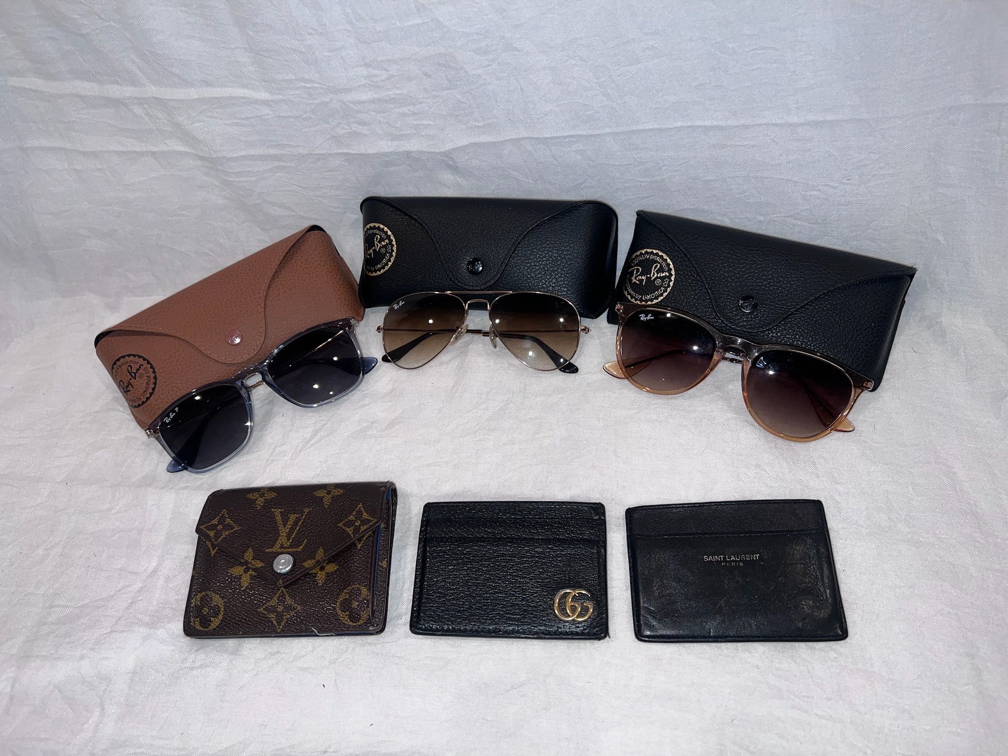 Raybans Louie Wallet, Gucci Wallet, And saint laurent Wallet