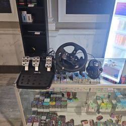 Logitech Foot Pedals, Steering Controler, Shifter.