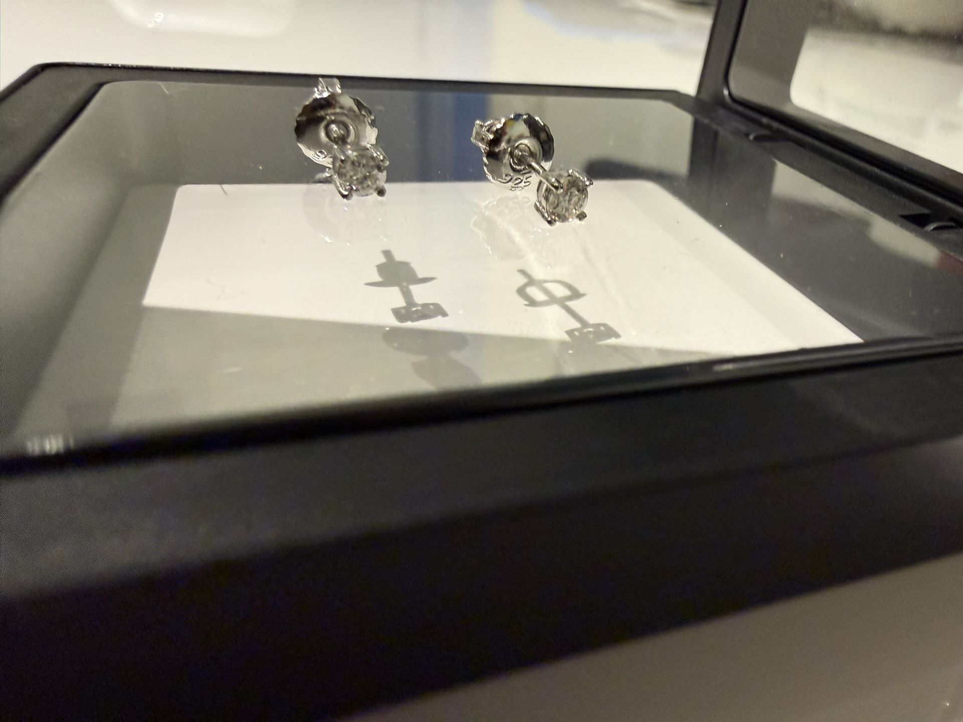 Brand new never worn Moissanite earrings with sterling silver