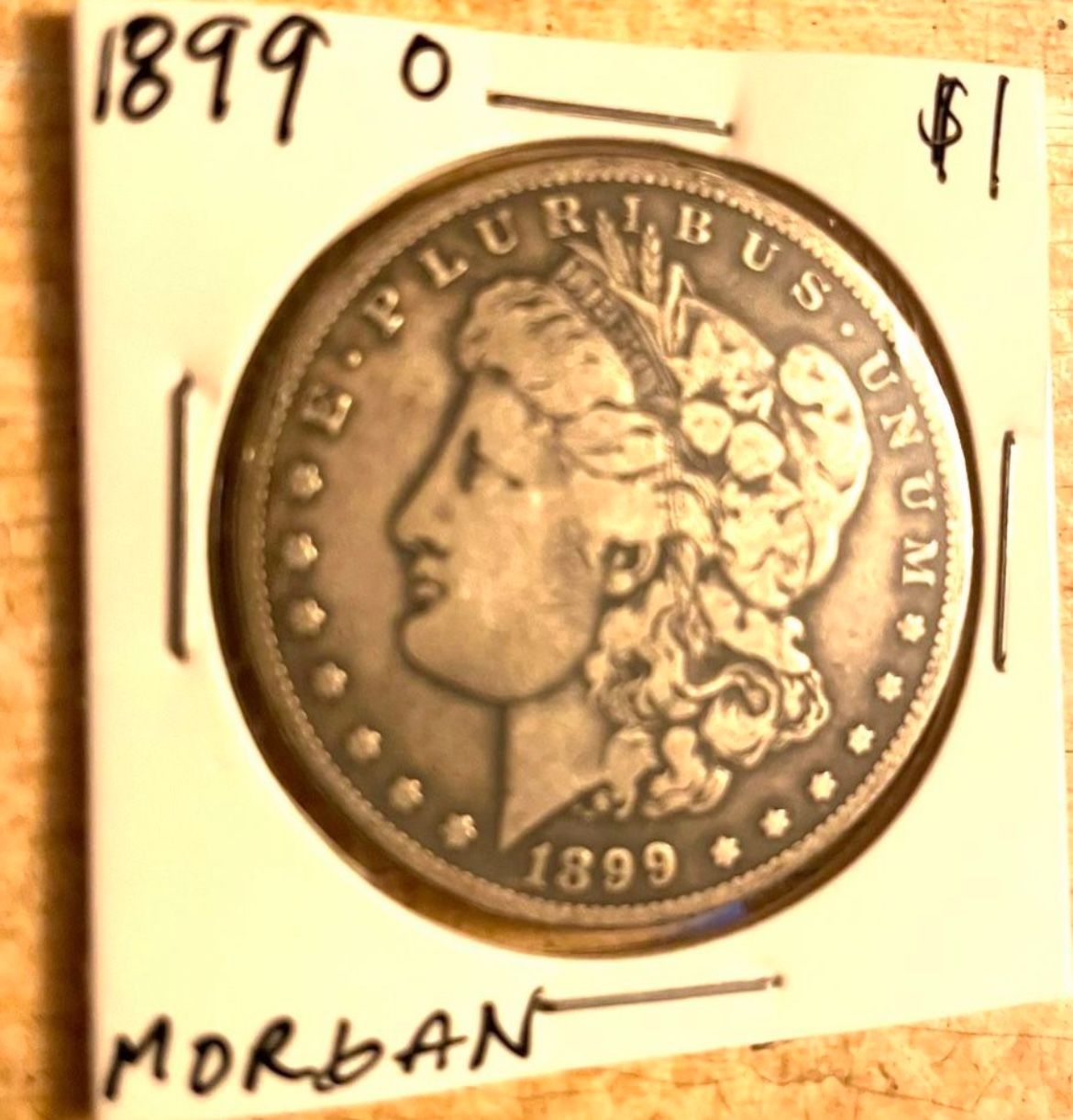 1899 O Morgan Silver Dollar