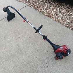Craftsman 25cc Gas String Trimmer $70 with trade-in or $85. 
 string trimmer has a 25cc engine. This Craftsman yard tool is red and black with a curve