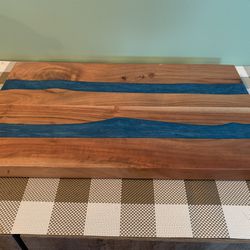10 By 17 Inch Solid Wood & Blue Epoxy Cutting Board. Has Two Stripes Of Blue Epoxy.