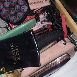 Huge bundle of new or like new wallets and purses need gone asap