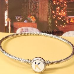 #2152, SIGNED, RUSTIC CUFF TM, CABLE STYLE (K) STAINLESS STEEL BRACELET.

