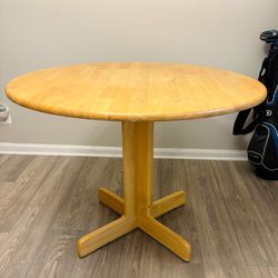 round table - no chairs included 