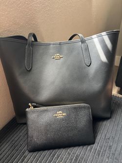 Coach black purse and wristlet