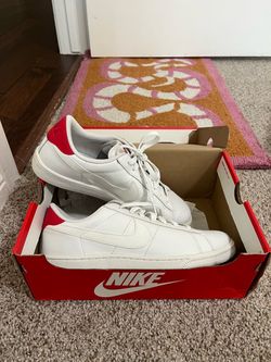 Nike White Low-Top Sneakers with Red Accent