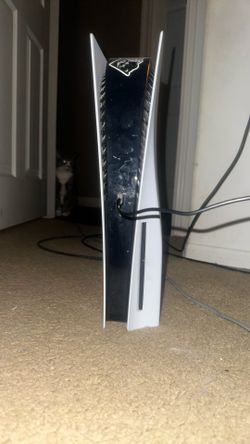 Play station 5 with red and blue controller