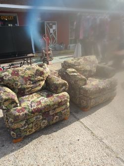 Two flower chairs with the ottoman