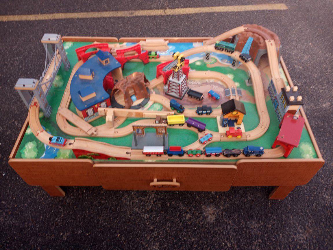 Wooden play table and tomhas the train set