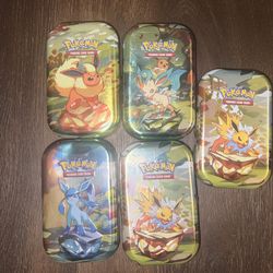 Pokemon Prismatic Evolutions Mini Tins