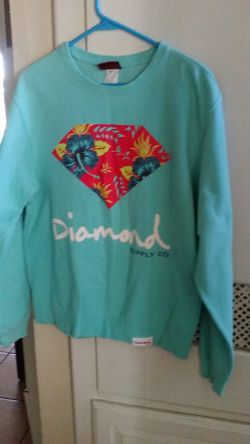 Diamond fleece size medium runs big.