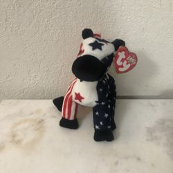 Ty Beanie Babie “Lefty” 2000.  Size  7 inches tall.  Sits  up.  Brand New with Tags.  Has been on display in a cabinet with a Ty beanie Babie collecti
